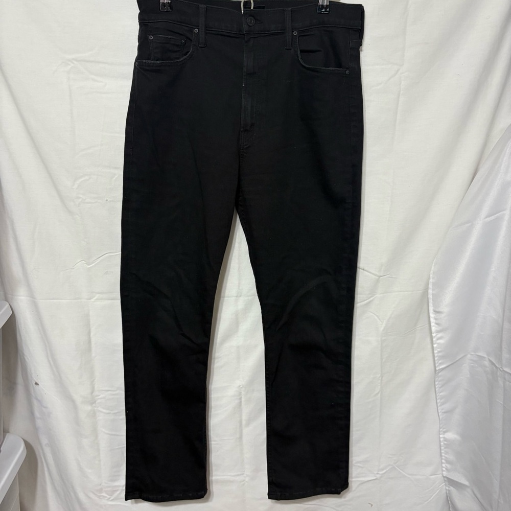 Black "Mother" brand jeans.